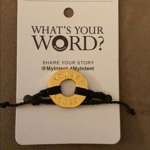 Braided pull string bracelet